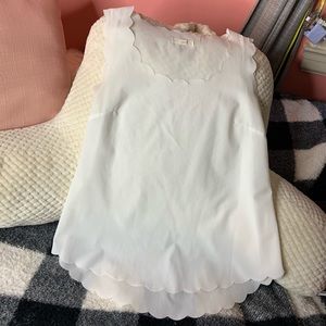 White sleeveless blouse